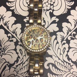 Geneva platinum cheetah faced watch